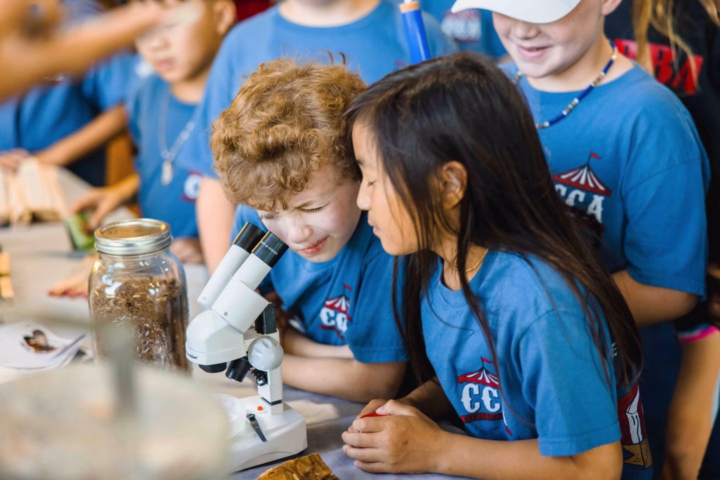 MS-Science-Fest-two-kids-look-in-microscope